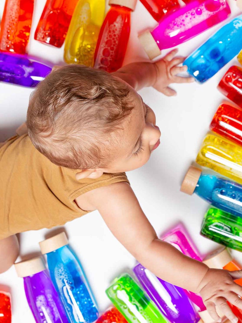 Brinquedo sensorial para bebê garrafa flutuante | petit boum Vermelho - Kiabi