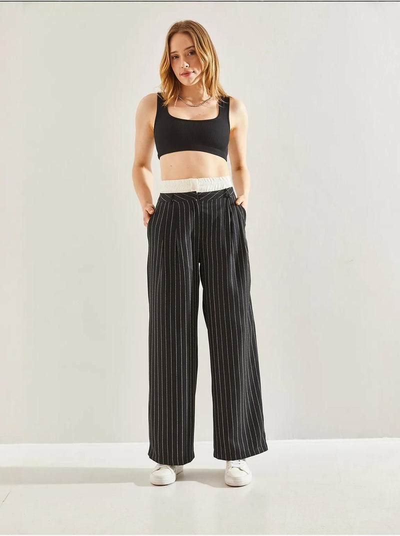 Calça às riscas com detalhe contrastante na cintura lucci Preto - Kiabi