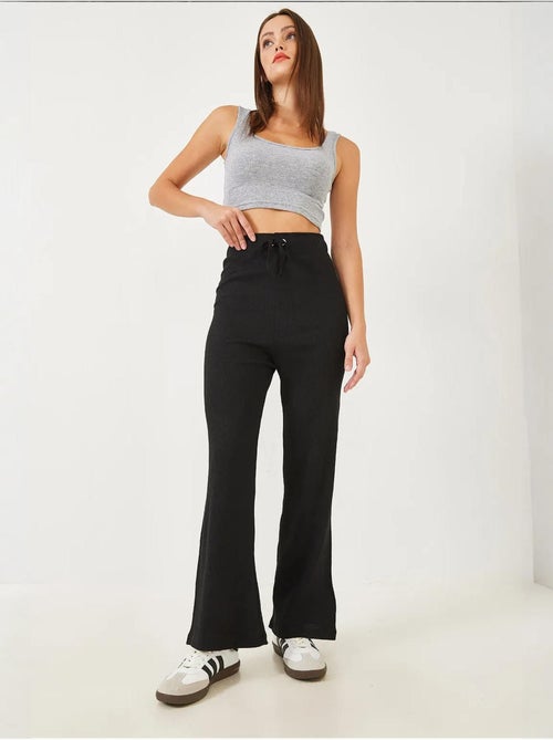 Calça canelada de perna larga com cós atado lucci - Kiabi Calça canelada de perna larga com cós atado lucci - Kiabi
