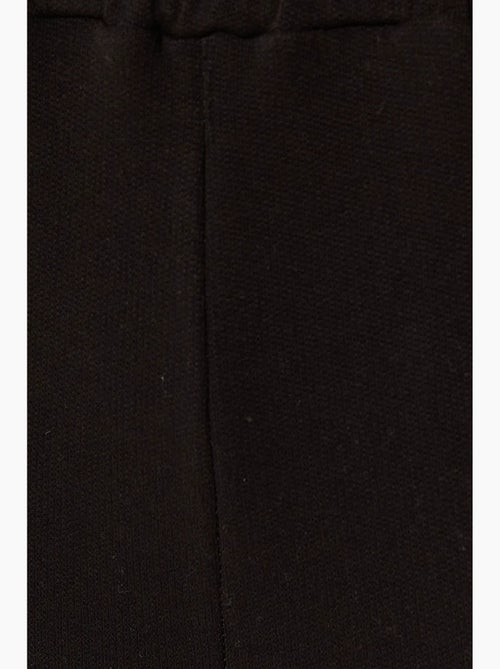 Calça de fato de treino básica hiccup - Kiabi Calça de fato de treino básica hiccup - Kiabi