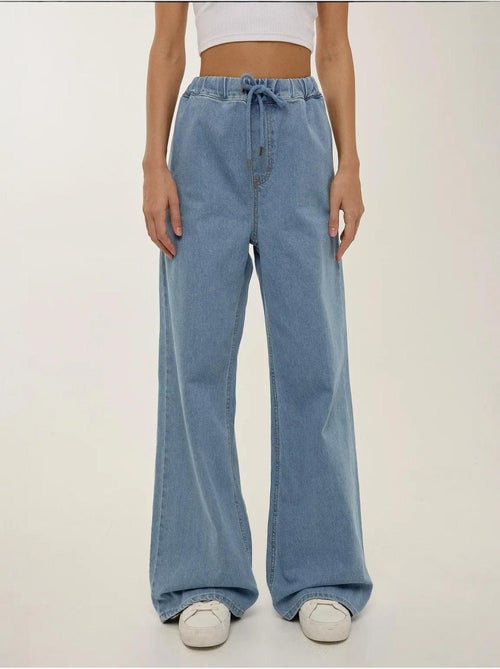 Calça de ganga larga com cintura alta e cordão hiccup - Kiabi Calça de ganga larga com cintura alta e cordão hiccup - Kiabi