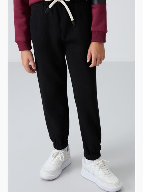 Calça de moletom infantil tommy - Kiabi Calça de moletom infantil tommy - Kiabi