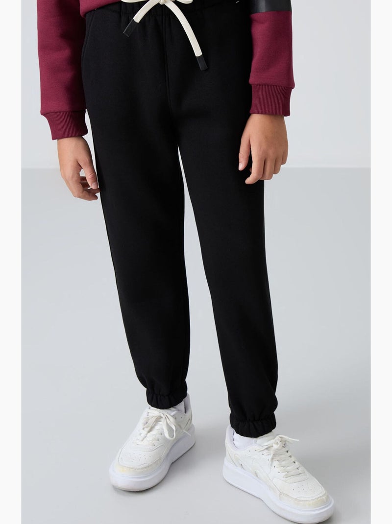 Calça de moletom infantil tommy Preto - Kiabi