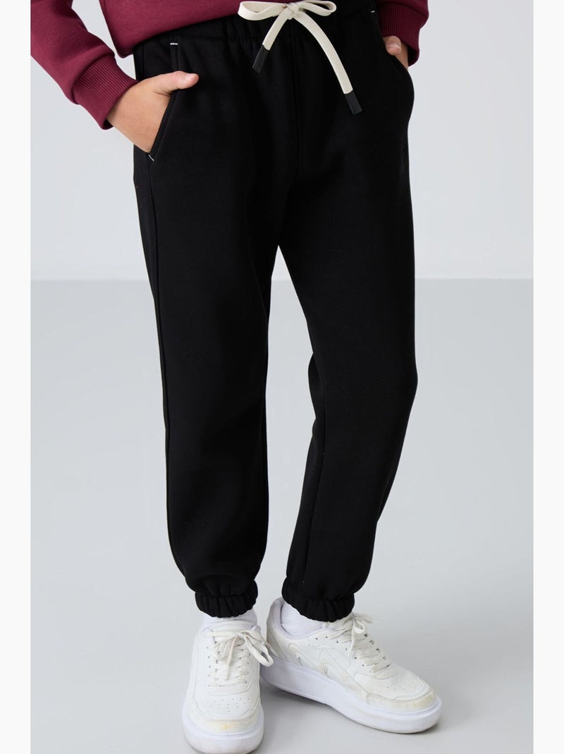Calça de moletom infantil tommy Preto - Kiabi