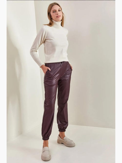Calça de pele com cós elástico e punhos lucci - Kiabi Calça de pele com cós elástico e punhos lucci - Kiabi
