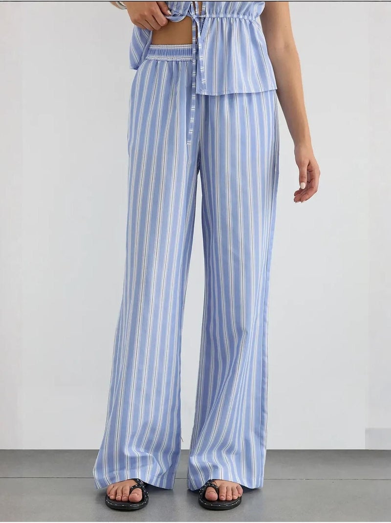Calça de perna larga às riscas com cós elástico hiccup Azul - Kiabi