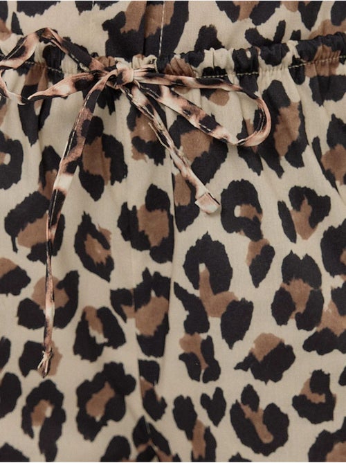 Calça direita com estampado de leopardo - Kiabi Calça direita com estampado de leopardo - Kiabi