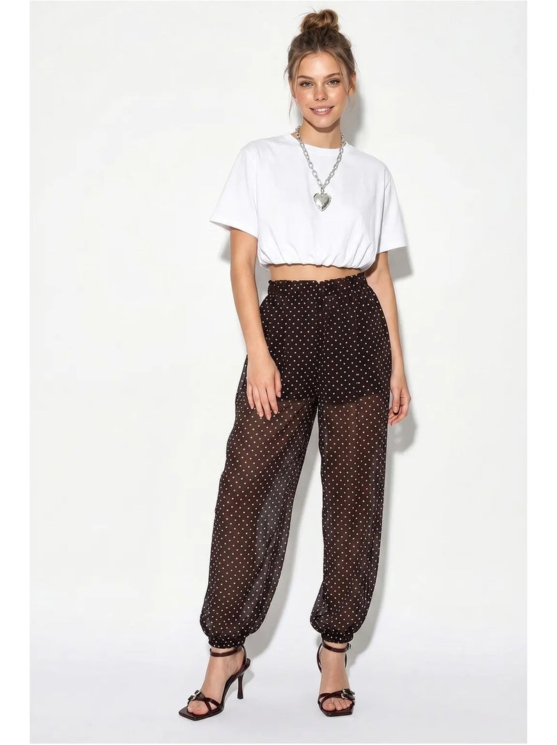 Calça jogger de chiffon com bolinhas lucci Castanho-chocolate - Kiabi