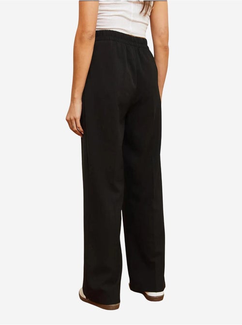 Calça palazzo com perna larga e cintura assimétrica e botões lucci - Kiabi Calça palazzo com perna larga e cintura assimétrica e botões lucci - Kiabi