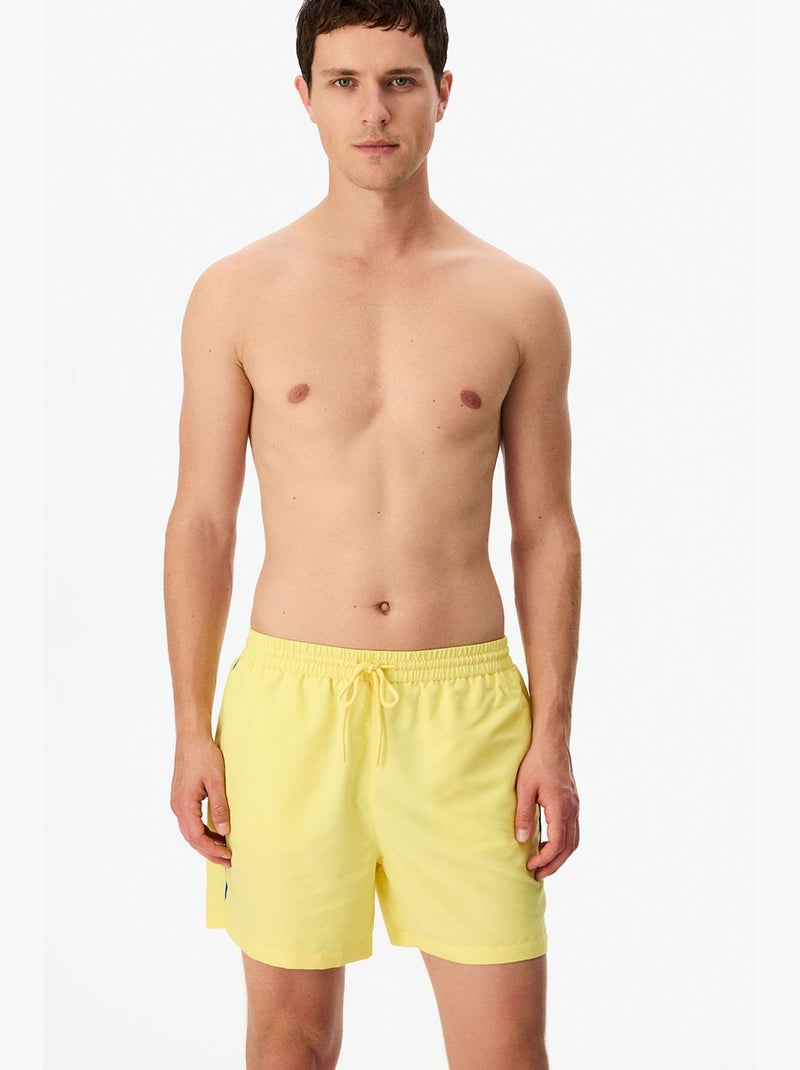 Calção de banho masculino opposite line penti Amarelo-limão - Kiabi