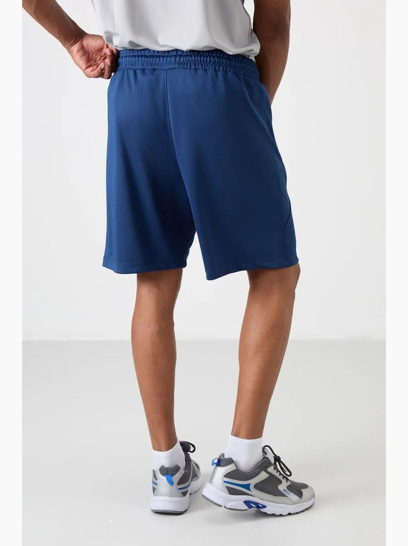Calção jogging liso em malha tommy Azul-cobalto - Kiabi