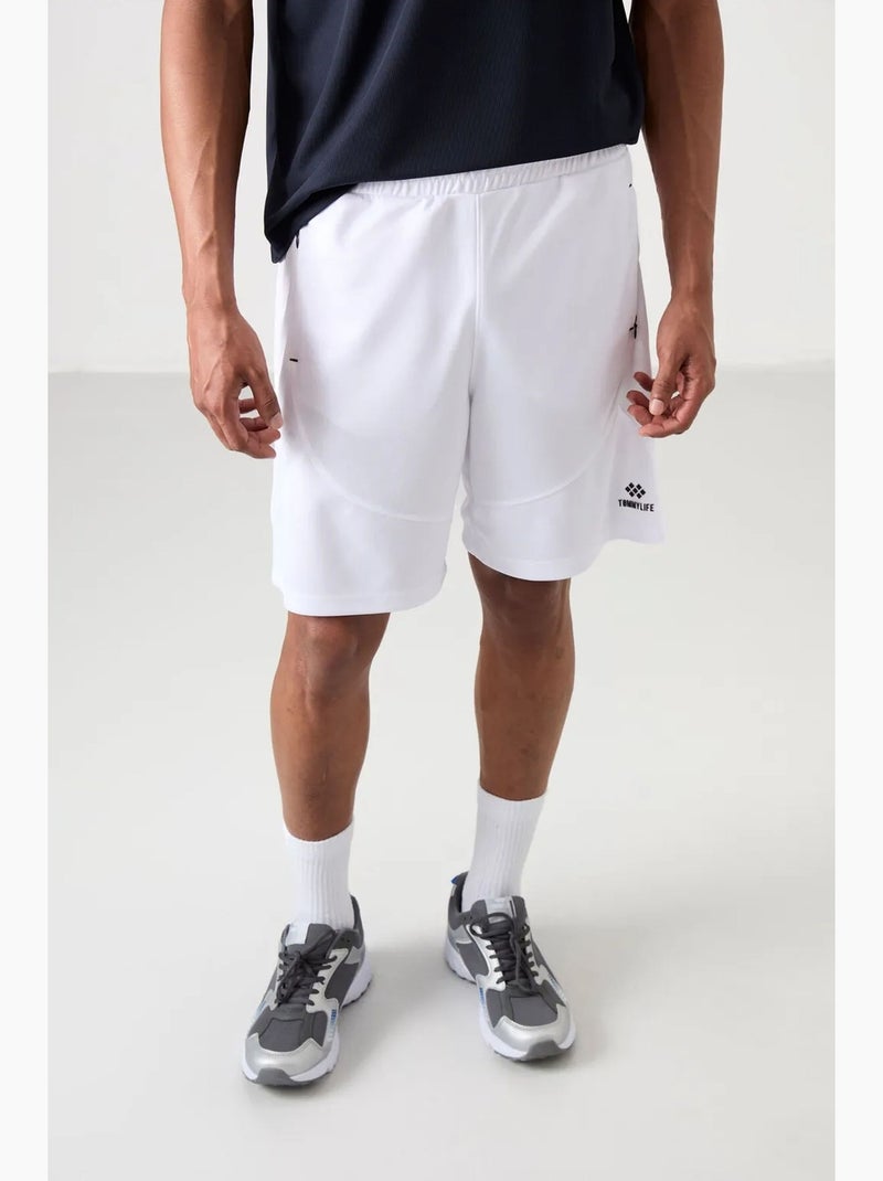 Calção jogging liso em malha tommy Branco - Kiabi