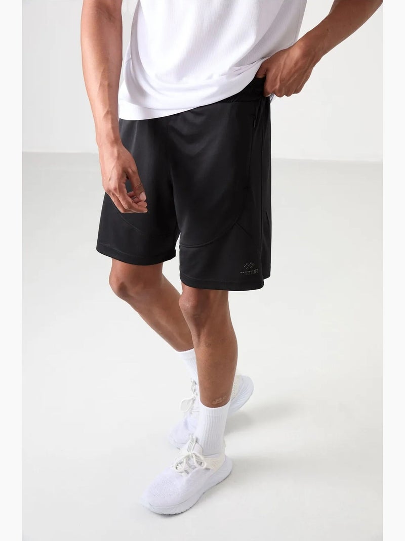 Calção jogging liso em malha tommy Preto - Kiabi