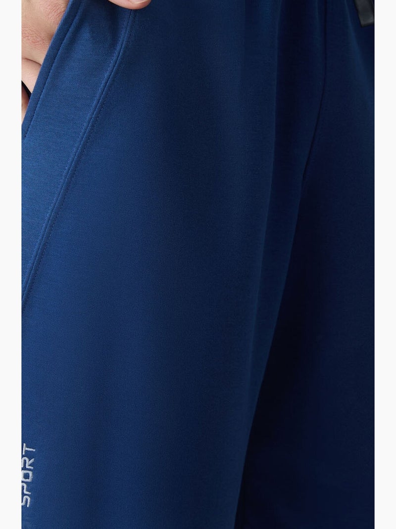 Calção jogging mistura de algodão tommy Azul - Kiabi