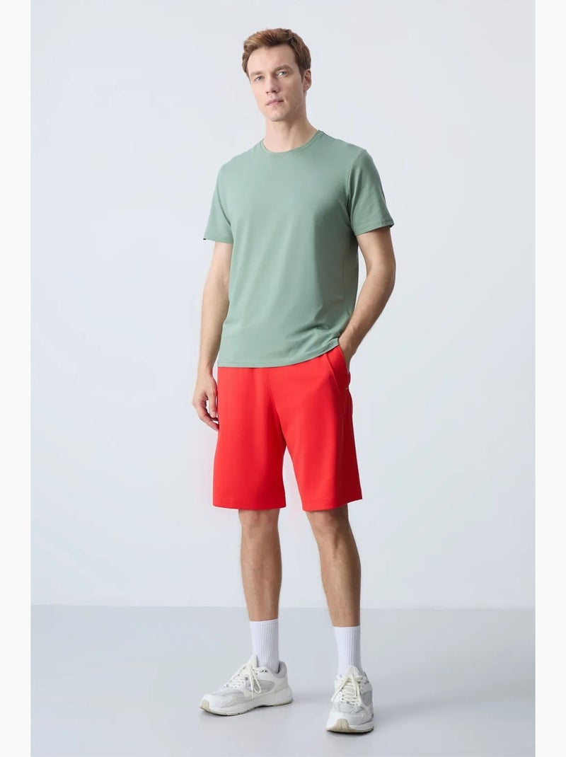 Calção jogging mistura de algodão tommy Vermelho - Kiabi
