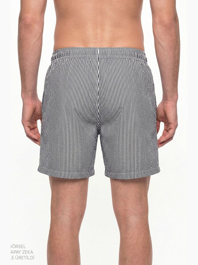 Calção masculino às riscas tissue penti Preto Branco - Kiabi
