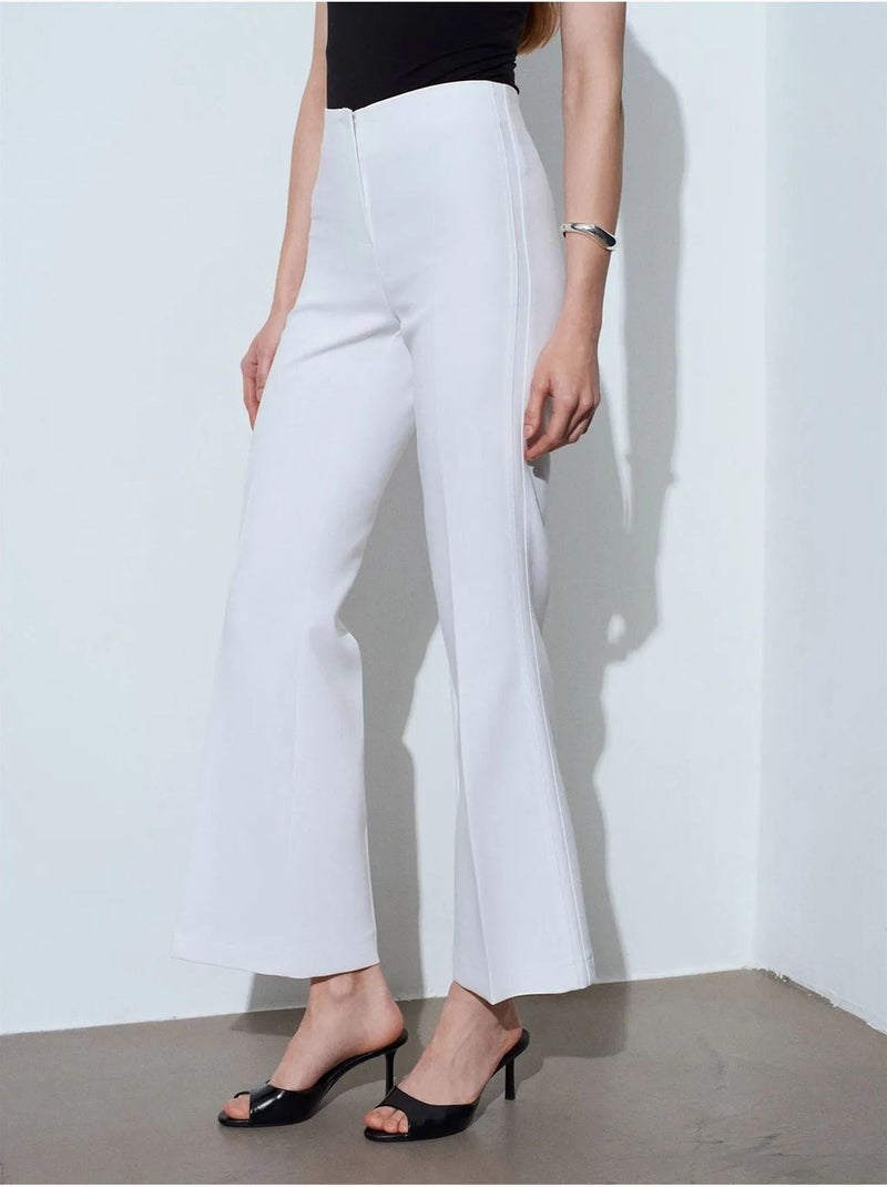 Calças à boca de sino de cintura subida para mulher Branco - Kiabi