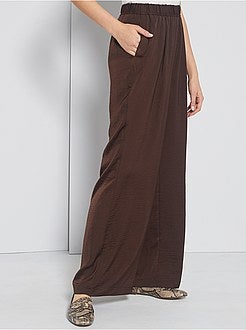 Calças acetinadas - Kiabi