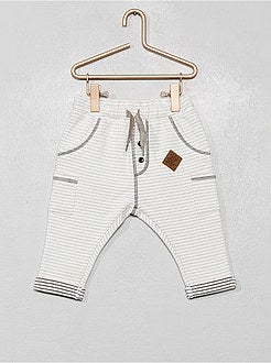 Calças às riscas em moletão - Kiabi