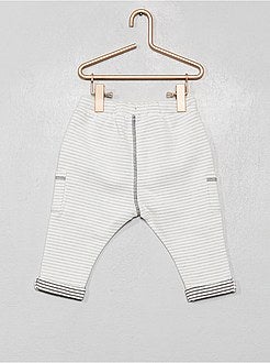 Calças às riscas em moletão - Kiabi