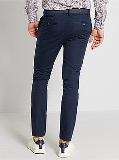 Calças chino skinny com cinto - Kiabi