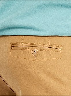 Calças chino skinny com cinto - Kiabi