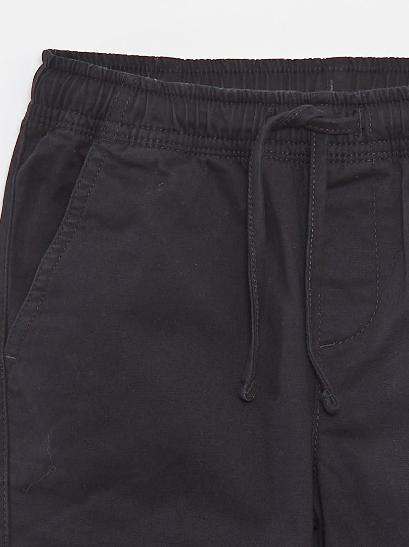 Calças com bolsos e cós ajustável Preto - Kiabi