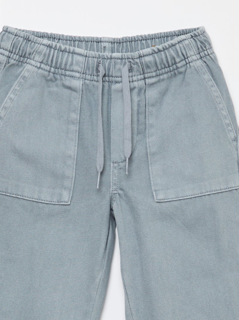 Calças com bolsos retangulares - Corte + ajustado Azul - Kiabi