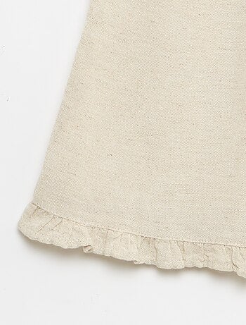 Calças com folhos na bainha