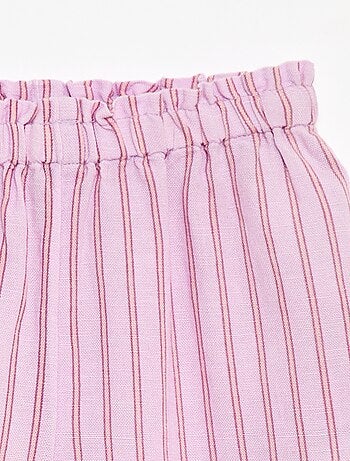 Calças com folhos na bainha
