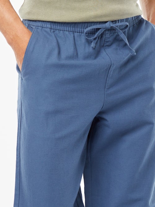 Calças com vários bolsos - Kiabi