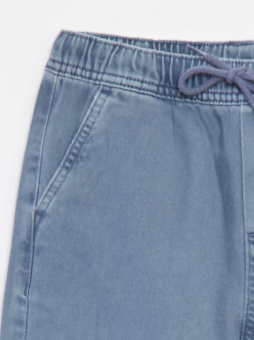 Calças com vários bolsos com cinto elástico - Kiabi