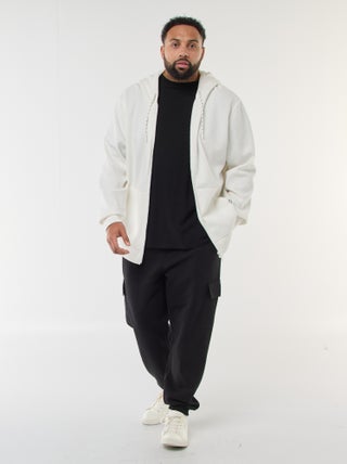 Calças de algodão lisas com bainha ajustada