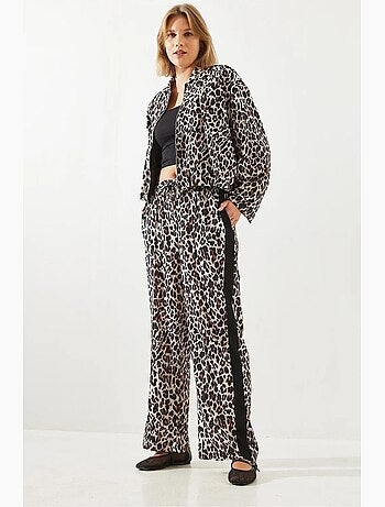 Calças de cintura subida com estampado leopardo e perna larga lucci