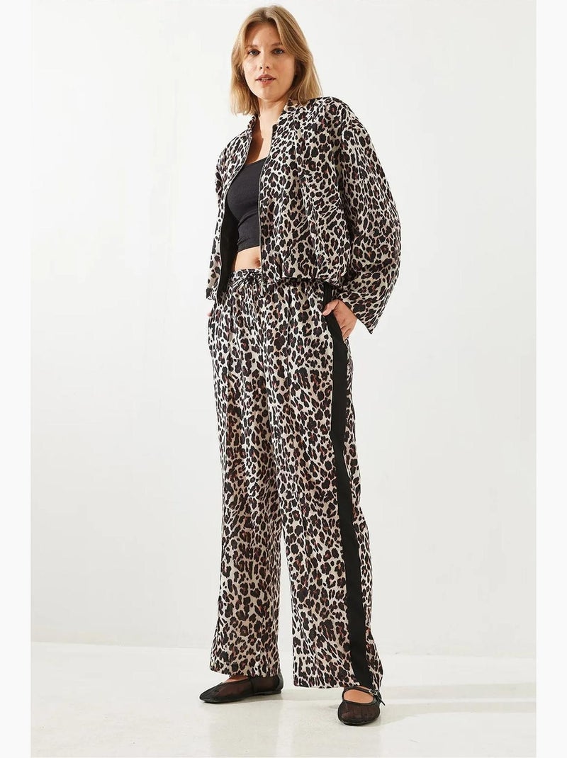Calças de cintura subida com estampado leopardo e perna larga lucci Bege natural - Kiabi