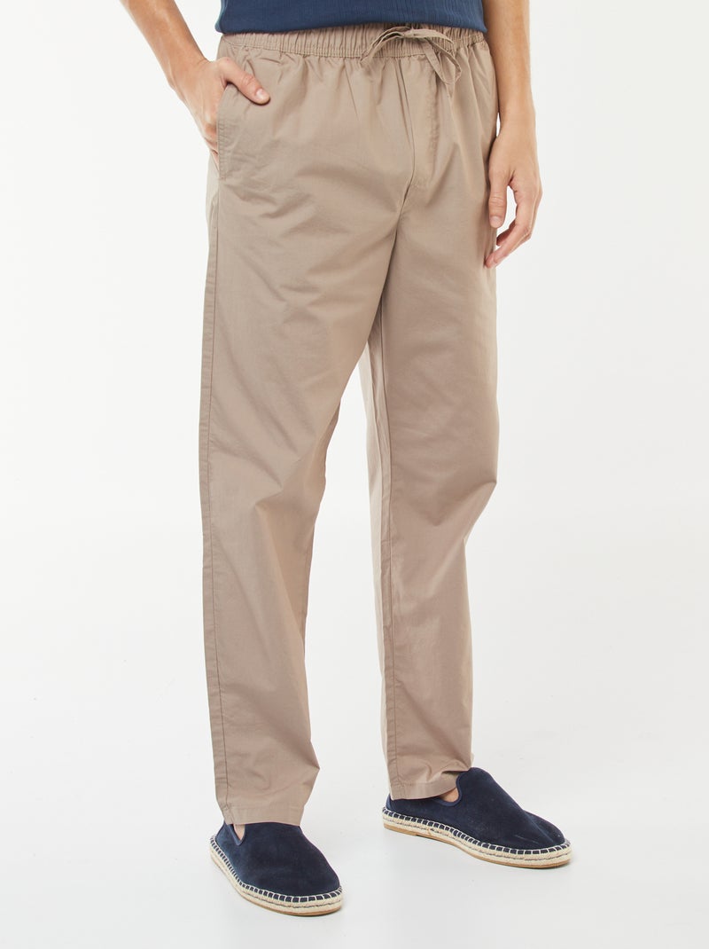 Calças de corte direito com cintura elástica Bege - Kiabi