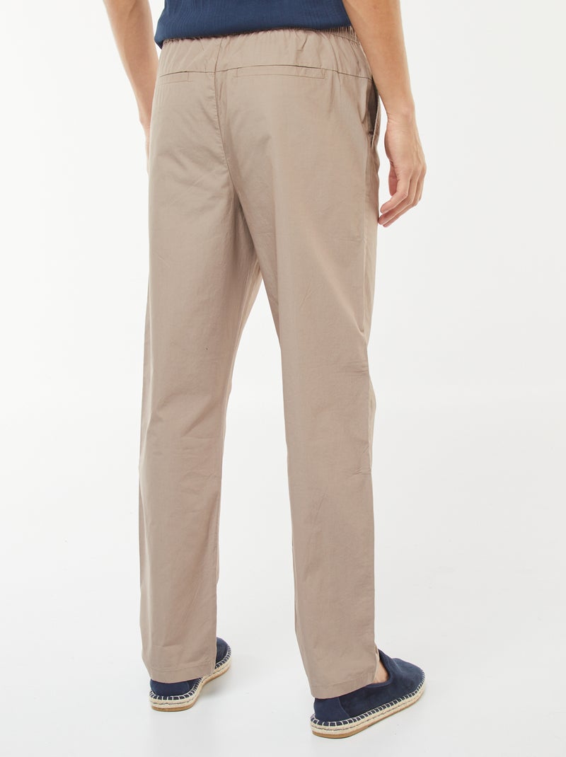 Calças de corte direito com cintura elástica Bege - Kiabi