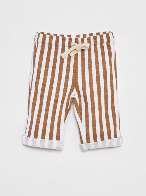 Calças de corte direito com estampado - Kiabi