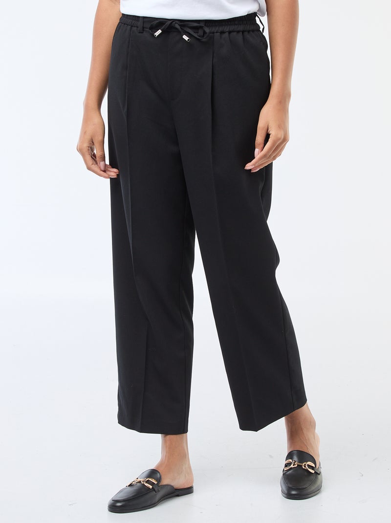 Calças de corte largo com cintura elástica + cordões para atar Preto - Kiabi