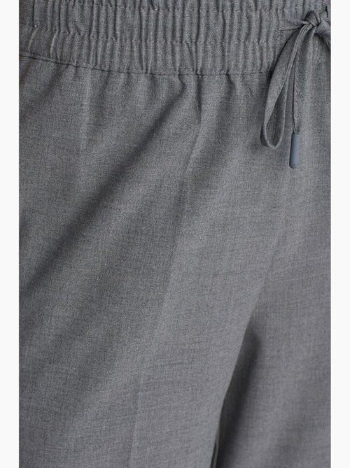 Calças de crepe de perna larga com cintura com cordão dilvin - Kiabi Calças de crepe de perna larga com cintura com cordão dilvin - Kiabi
