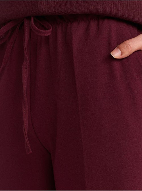 Calças de crepe de perna larga dilvin - Kiabi Calças de crepe de perna larga dilvin - Kiabi