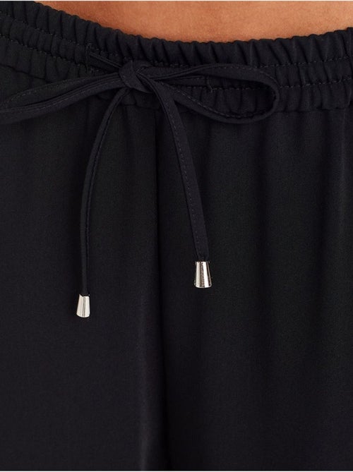 Calças de crepe de perna larga - Kiabi Calças de crepe de perna larga - Kiabi