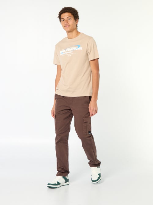 Calças de fato de treino com bolsos de aba - Kiabi Calças de fato de treino com bolsos de aba - Kiabi