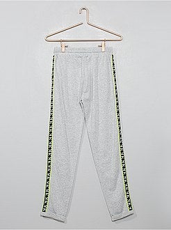 Calças de fato de treino com faixas com pormenores fluorescentes - Kiabi