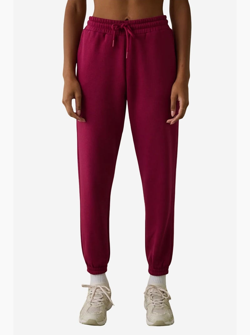 Calças de fato de treino de cintura subida com detalhe de atar, cardadas penti Magenta - Kiabi
