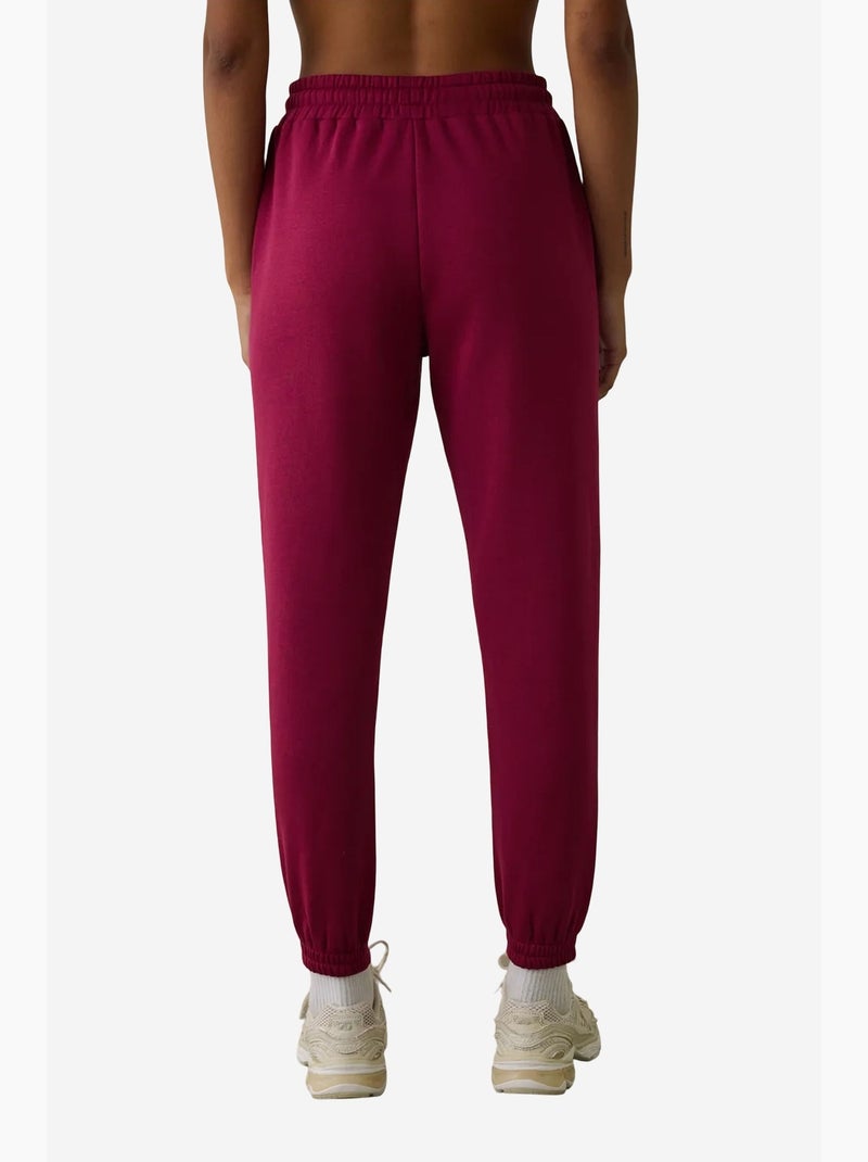 Calças de fato de treino de cintura subida com detalhe de atar, cardadas penti Magenta - Kiabi