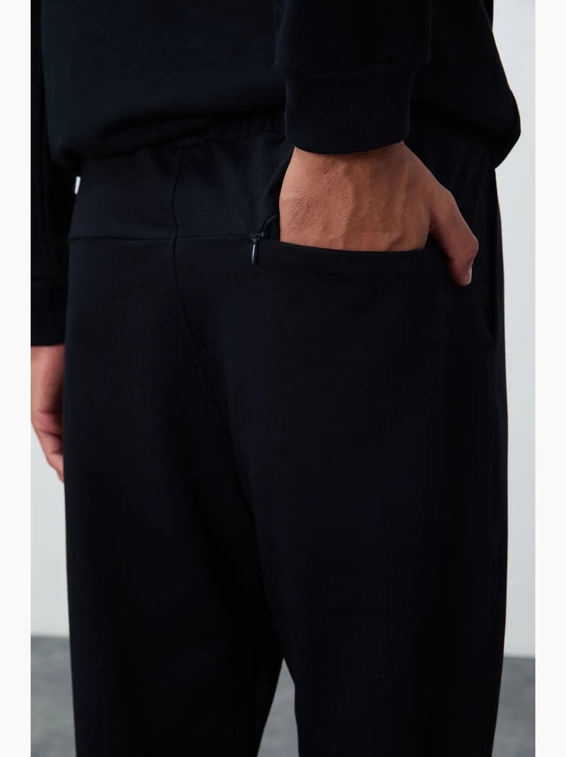 Calças de fato de treino de homem regular fit em mistura de algodão tommy Azul-lago - Kiabi