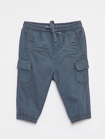 Calças de fato de treino de sarja com bolsos de aba