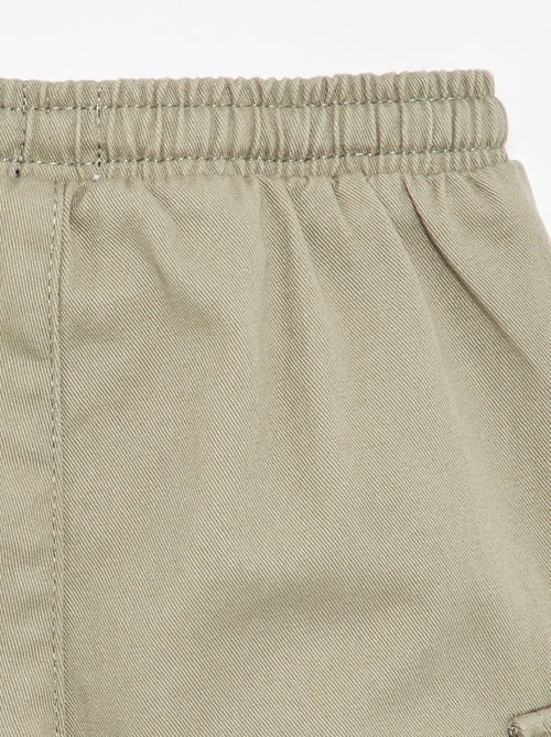 Calças de fato de treino de sarja com bolsos de aba - Kiabi Calças de fato de treino de sarja com bolsos de aba - Kiabi