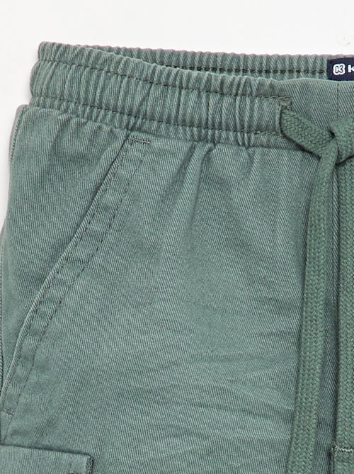 Calças de fato de treino de sarja com bolsos de aba - Kiabi Calças de fato de treino de sarja com bolsos de aba - Kiabi